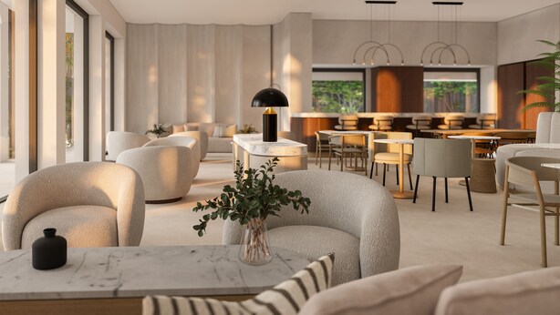 Una sala de estar moderna con un sofá, una mesa de centro y un comedor con sillas y una mesa.