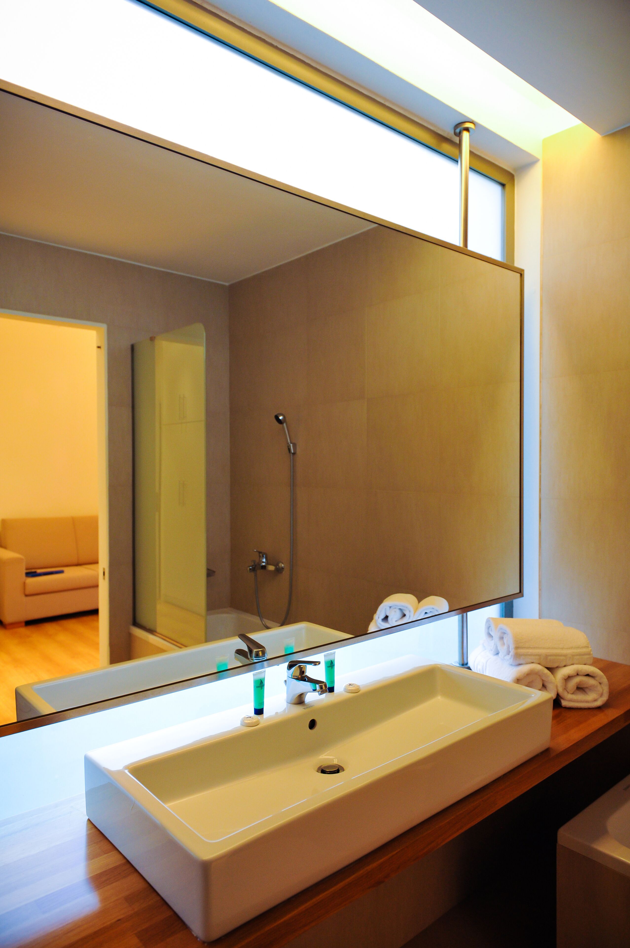 suite | bathroom | shower, hair dryer, bidet, towels