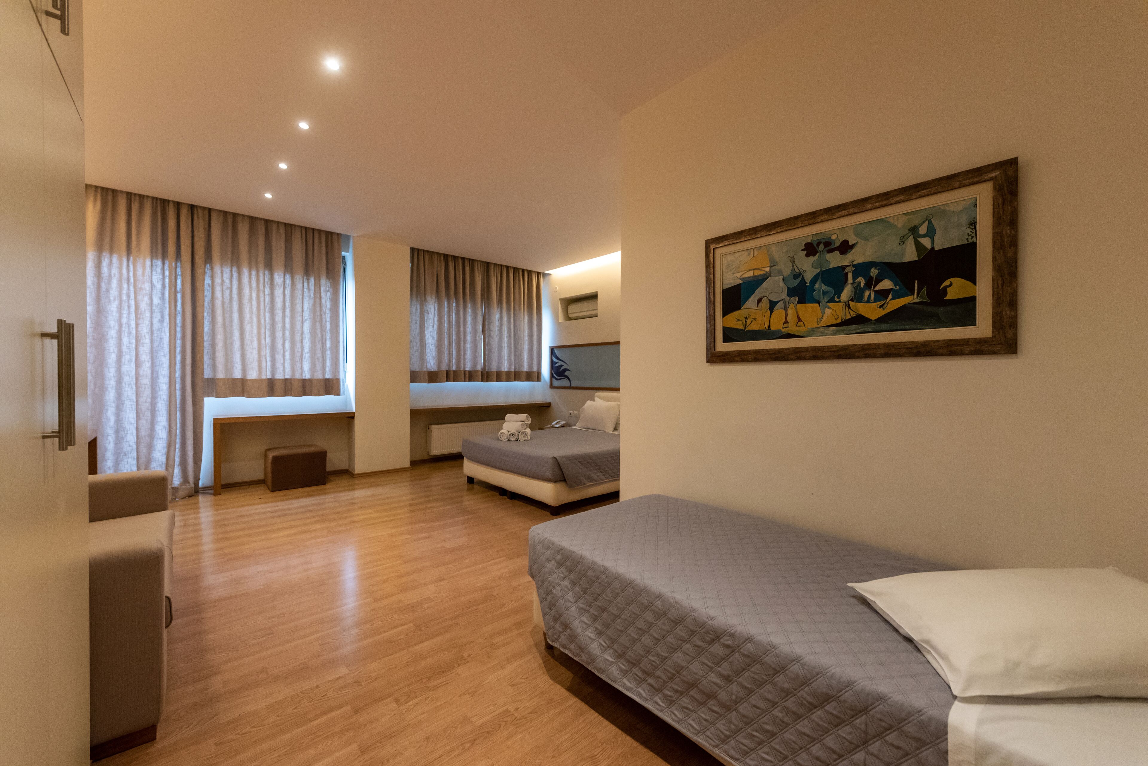 superior quadruple room | 1 bedroom, minibar, in-room safe, individually decorated