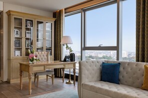 prestige city view suite | Living area | TV