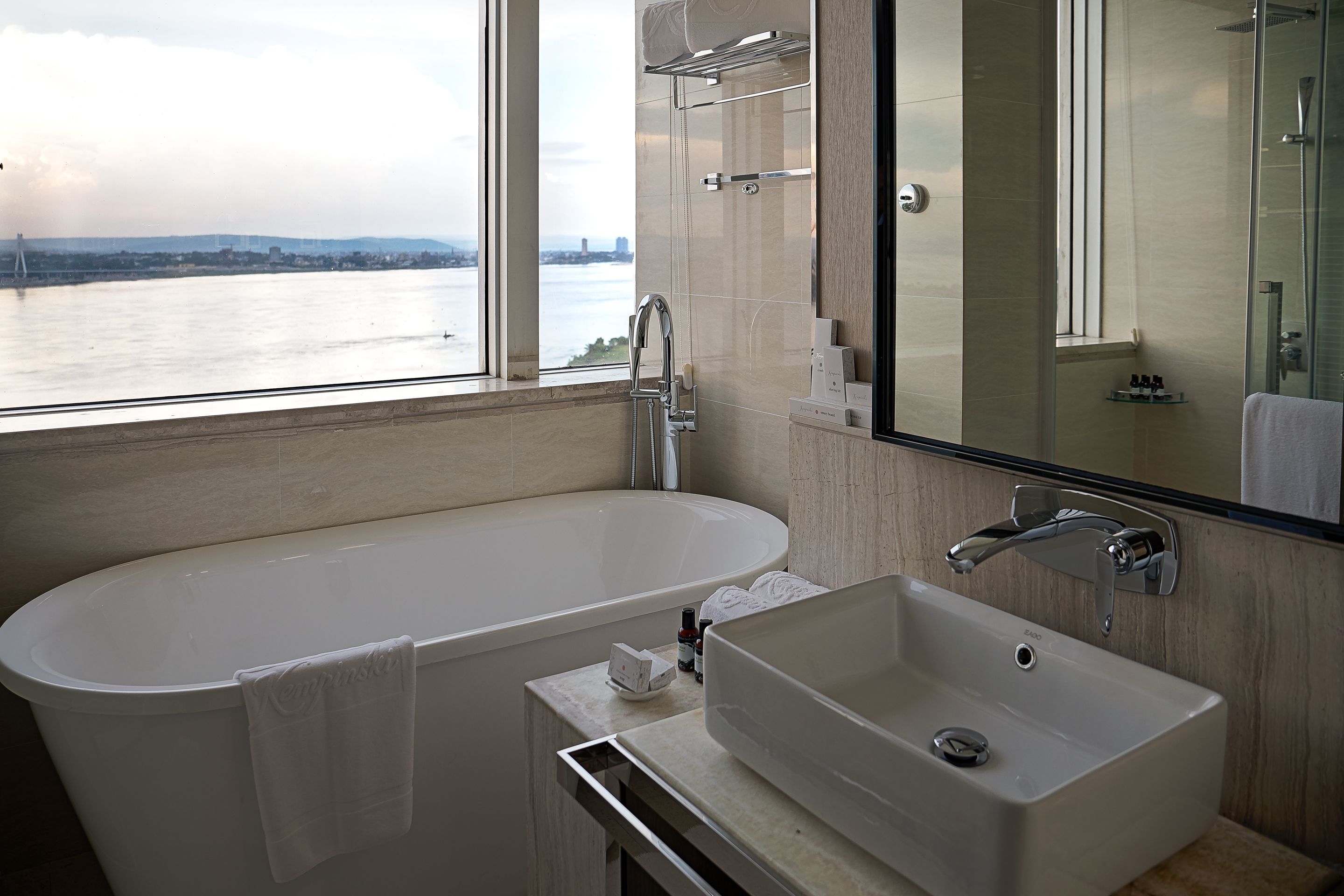 separate bathtub and shower, free toiletries, hair dryer, bathrobes