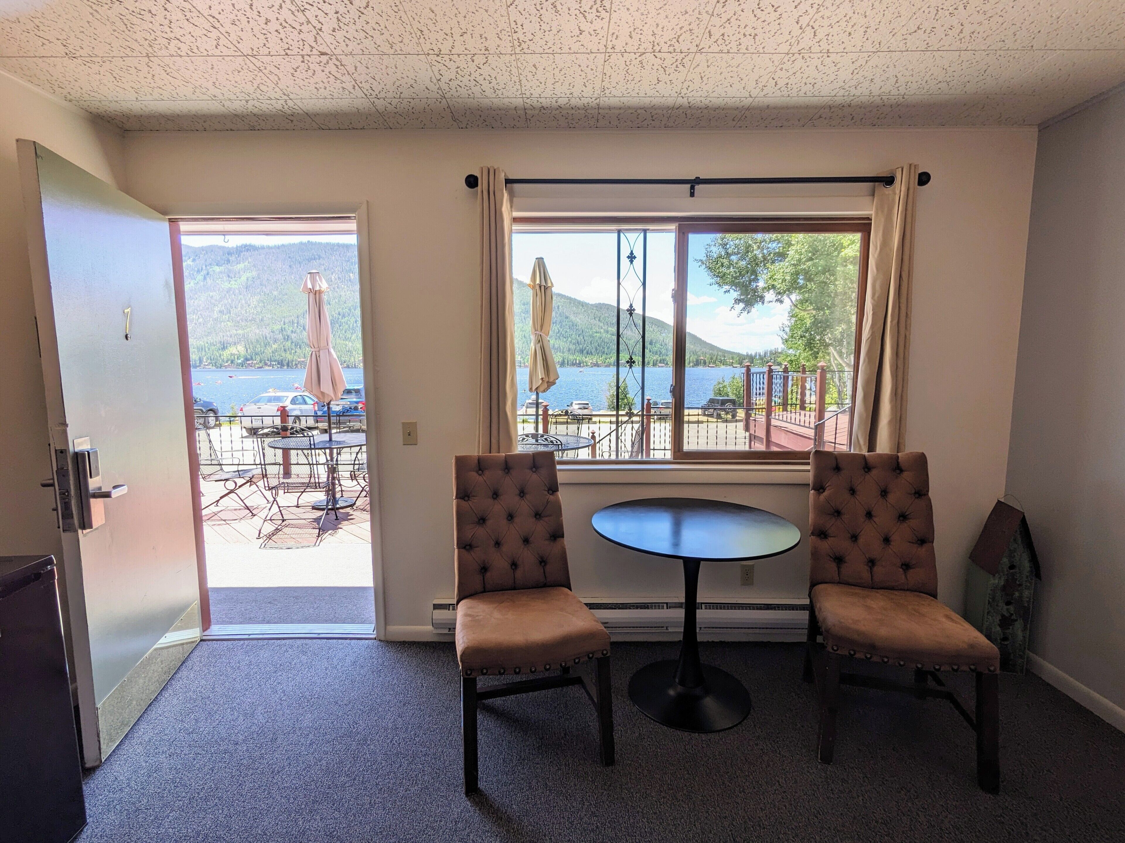 Standard Room, Lake View | Blackout drapes, iron/ironing board, free WiFi, bed sheets