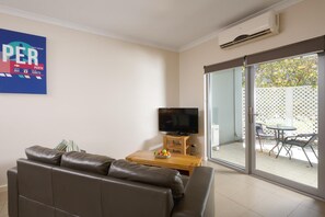 One Bedroom Apartment with Courtyard  | Living room