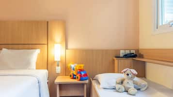 Standard Room, Multiple Beds | Minibar, in-room safe, desk, soundproofing