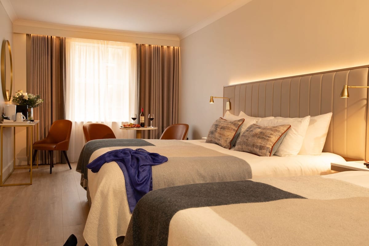 In-room safe, desk, blackout curtains, iron/ironing board