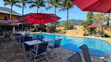 Outdoor pool, pool umbrellas, sun loungers