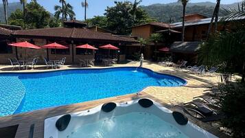 Outdoor pool, pool umbrellas, sun loungers