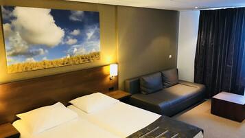 Suite, 2 Twin Beds, Balcony | In-room safe, desk, blackout drapes, iron/ironing board