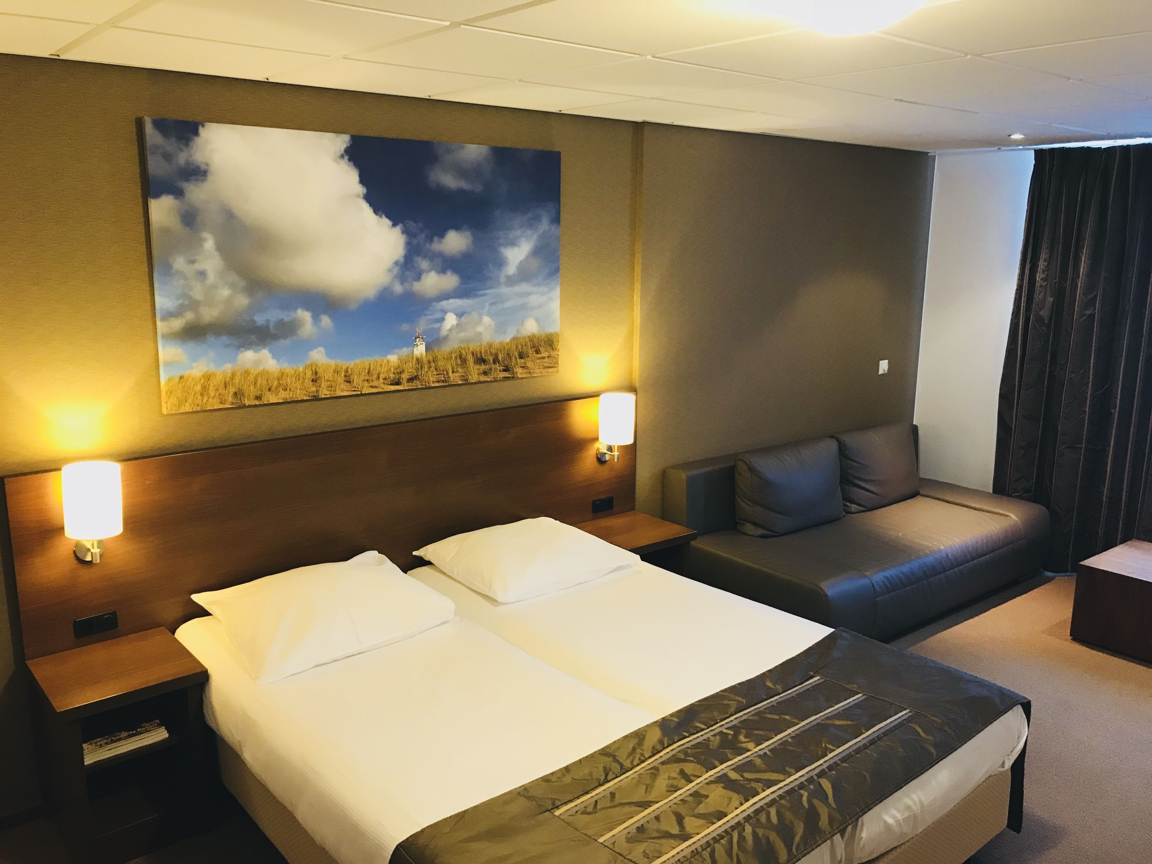 suite, 2 single beds, balcony | in-room safe, desk, blackout curtains, iron/ironing board