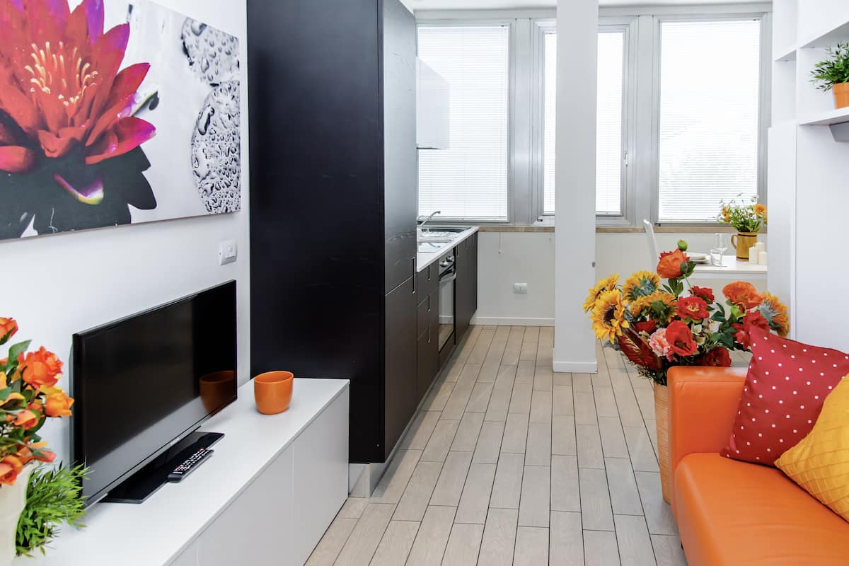 Studio | Privékeuken | Een koelkast/vriezer, een magnetron, een oven, een kookplaat