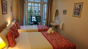 Standard Triple Room, Shared Bathroom | Desk, blackout drapes, iron/ironing board, free WiFi