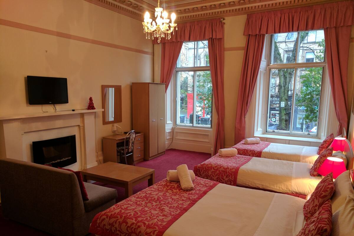 Family Room, Private Bathroom | Desk, blackout drapes, iron/ironing board, free WiFi