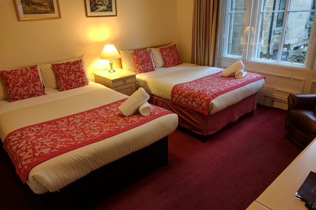Family Quadruple Room | Desk, blackout drapes, iron/ironing board (on request), WiFi (free)