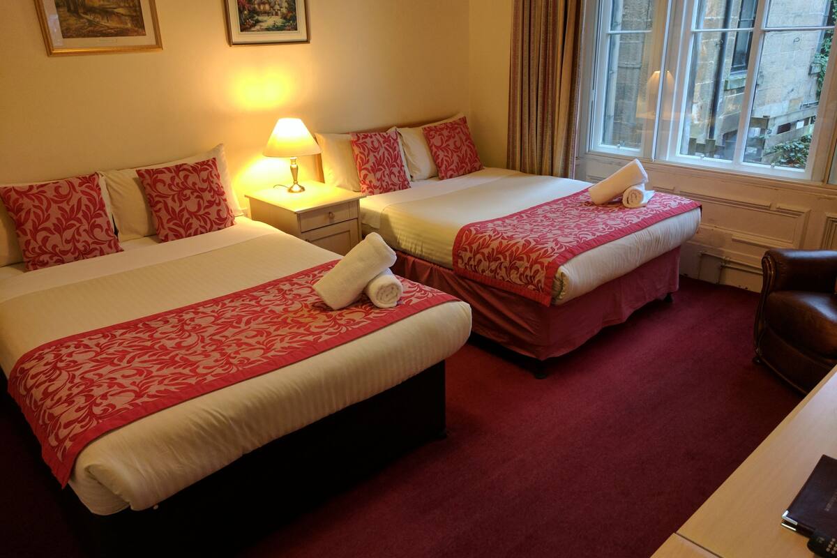 Family Quadruple Room | Desk, blackout drapes, iron/ironing board, free WiFi