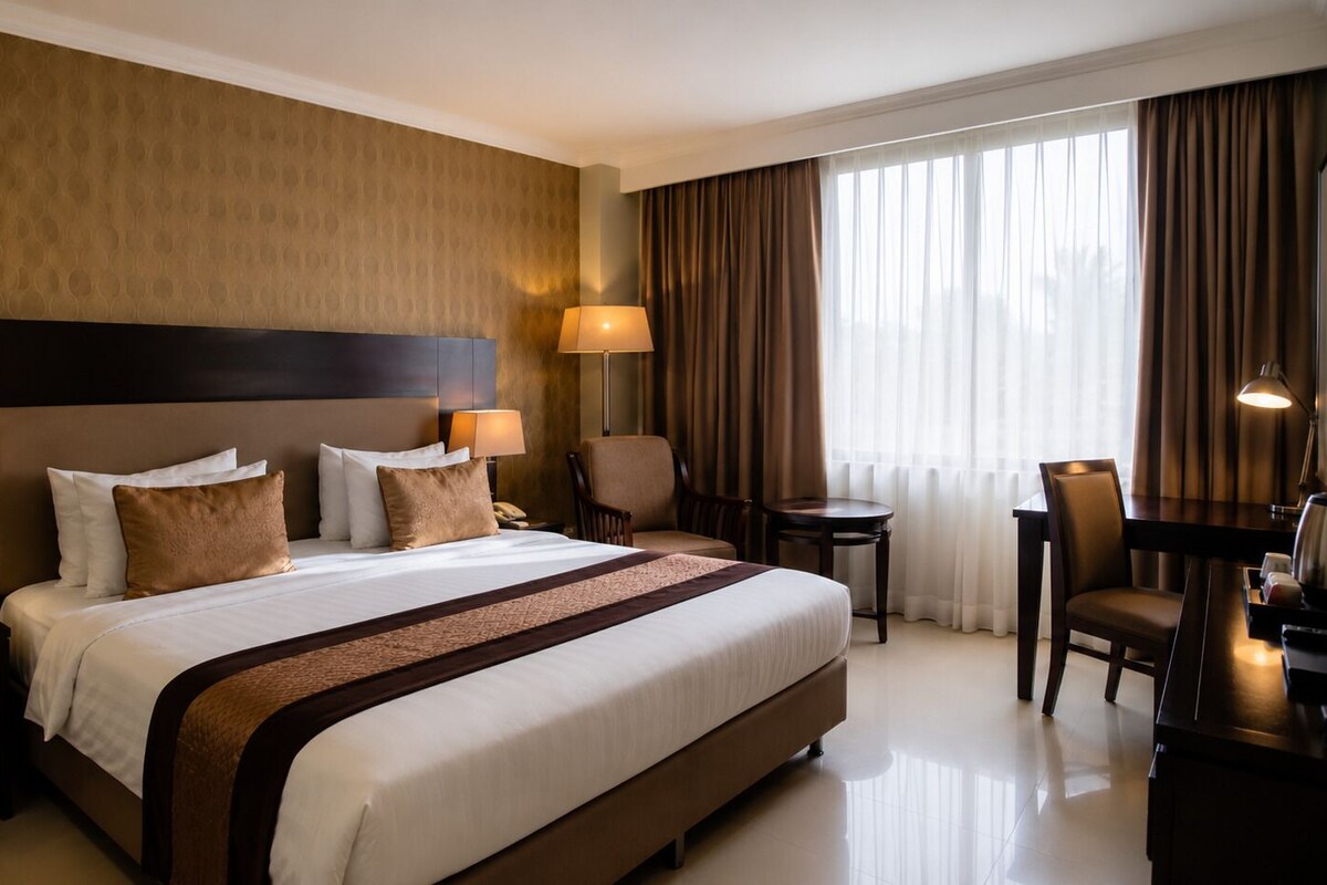 Een minibar, een kluis op de kamer, gratis wifi, beddengoed