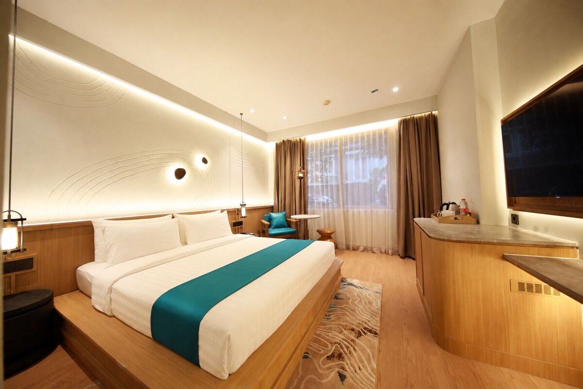 Kamer (Premier) | Een minibar, een kluis op de kamer, gratis wifi, beddengoed