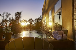 Outdoor pool, a heated pool, pool loungers