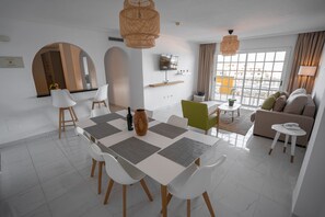 Deluxe Suite, 3 Bedrooms, Terrace, Sea View | Living area | 32-inch LED TV with satellite channels, TV - El Marqués Palace by Intercorp Hotel Group (Santiago del Teide)