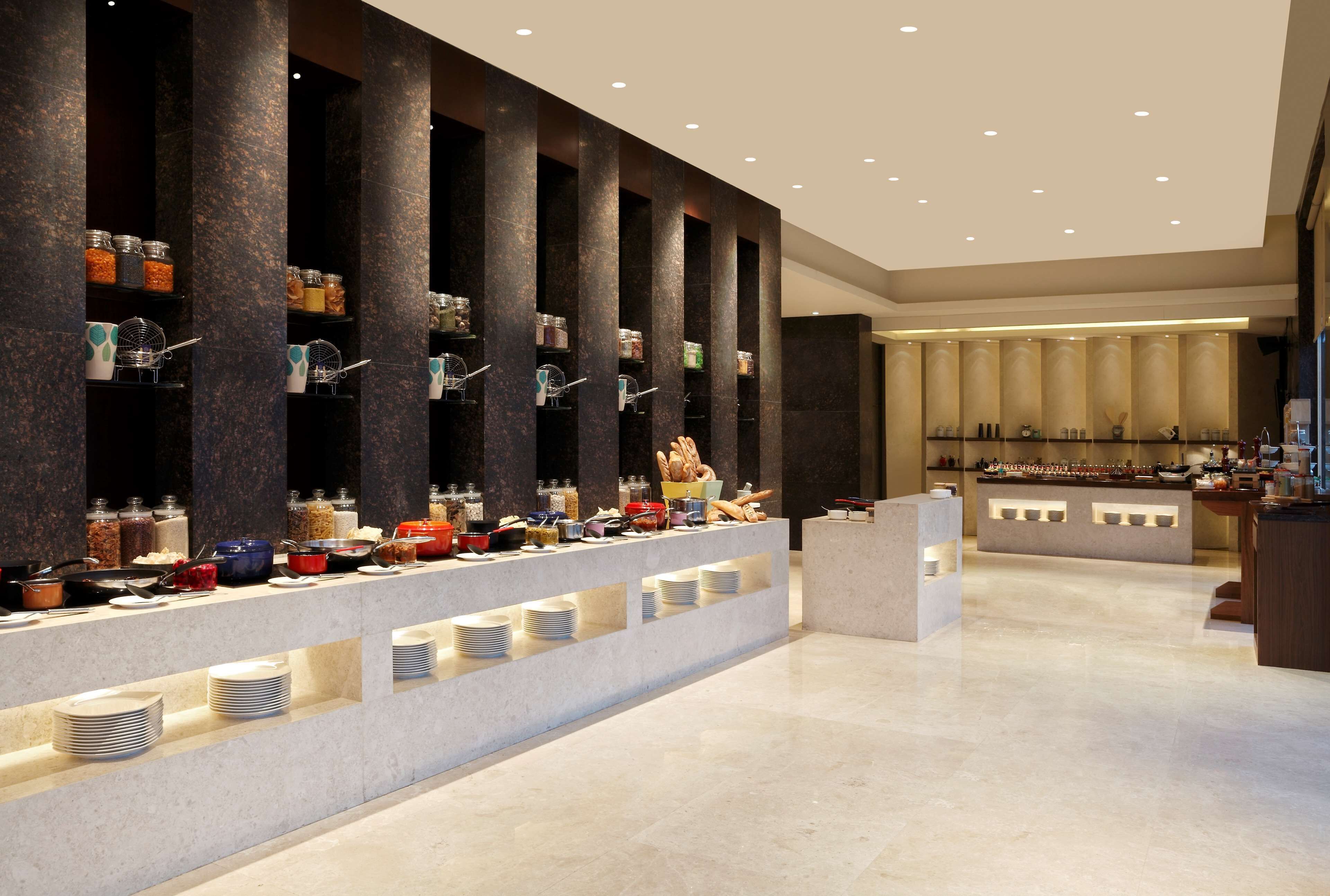 3 restaurants, breakfast, lunch, dinner served; indian cuisine