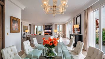 Suite (Penthouse) | Living area | 42-inch flat-screen TV with premium TV channels, TV, first-run films