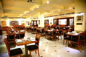 Breakfast, lunch served; international cuisine, al fresco dining