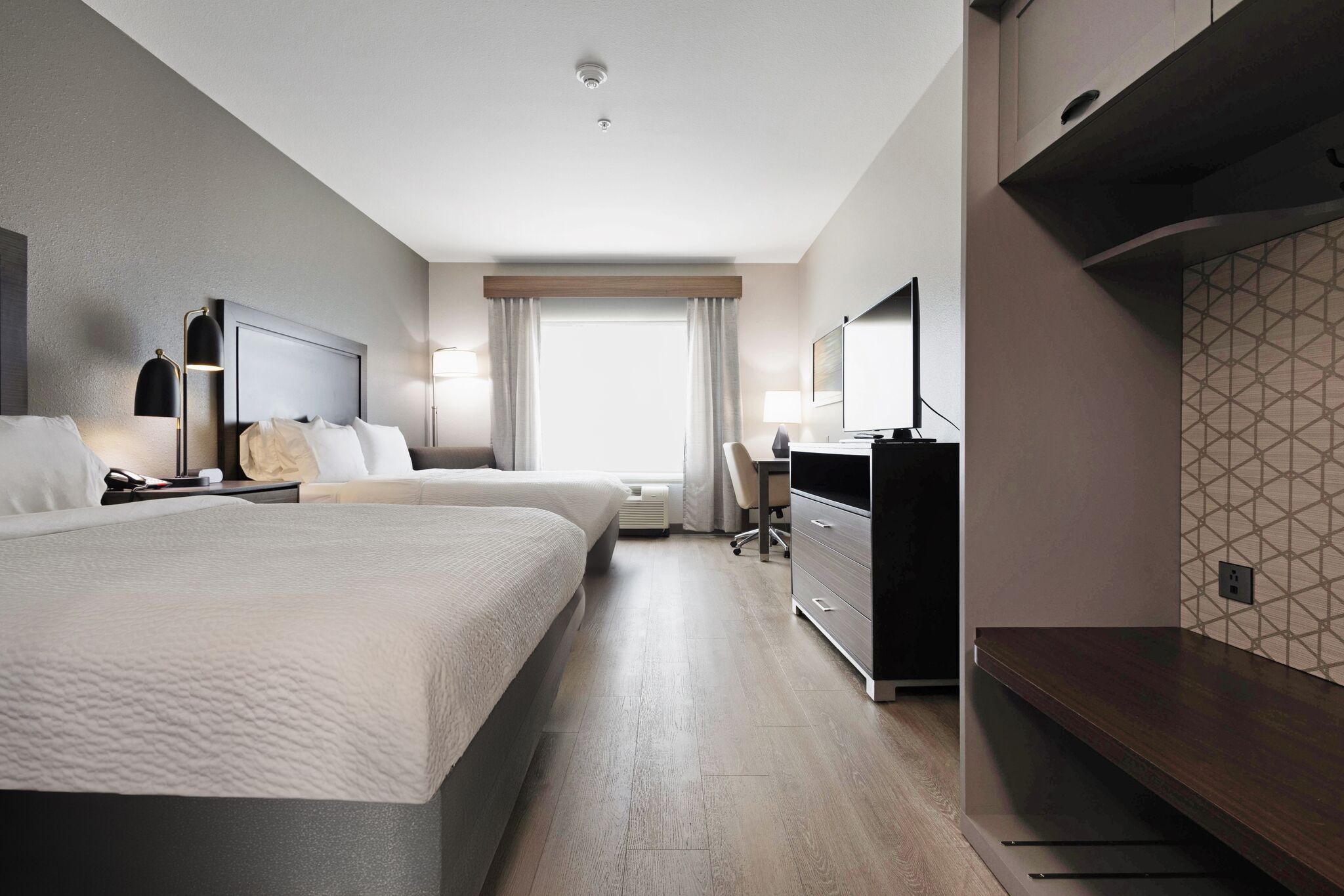 premium bedding, desk, laptop workspace, blackout curtains