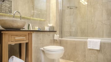 Designer toiletries, hair dryer, towels, soap