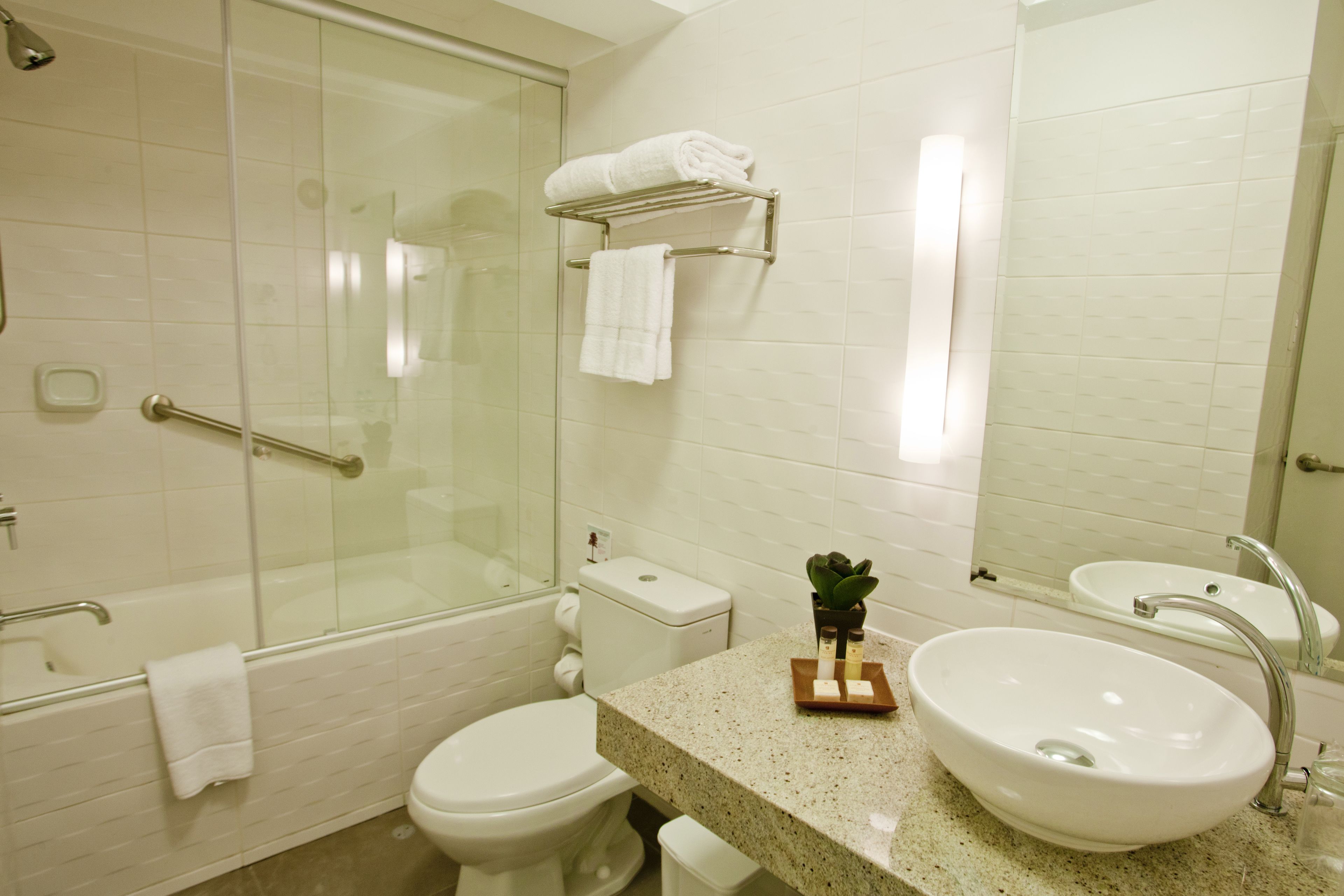 superior double room | bathroom | shower, hair dryer, towels