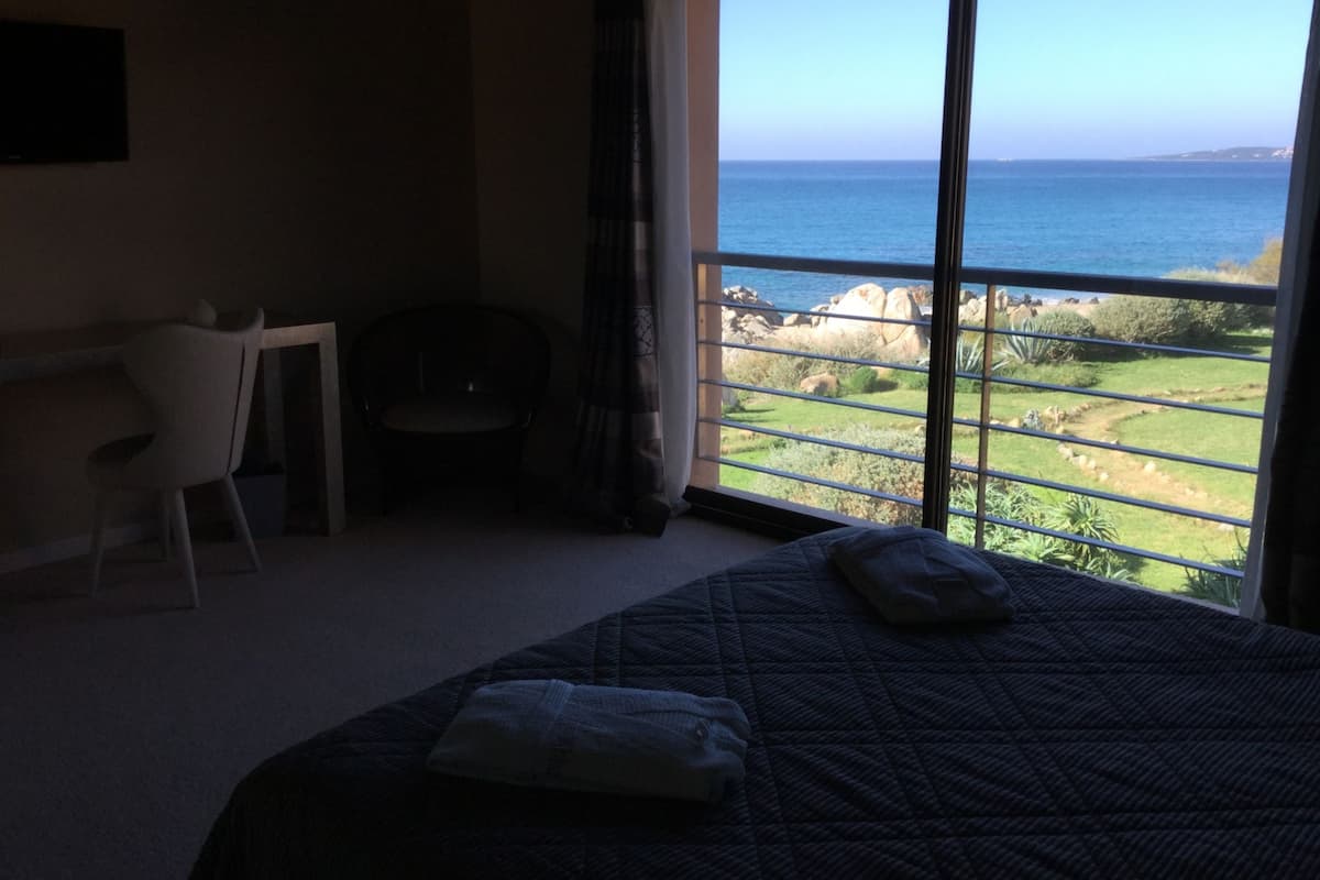 Family Room, 2 Bedrooms, Partial Sea View | Premium bedding, minibar, in-room safe, desk