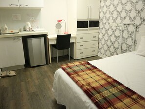 Deluxe Room, No Windows | Bathroom | Shower, rainfall showerhead, free toiletries, hair dryer