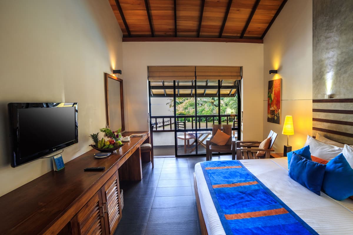 Standard Double Room - Pool / Garden View | 1 chambre, surmatelas, minibar, coffres-forts dans les chambres