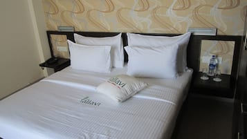 Quarto | Frigobar, cofres nos quartos, individualmente mobiliados, escrivaninha
