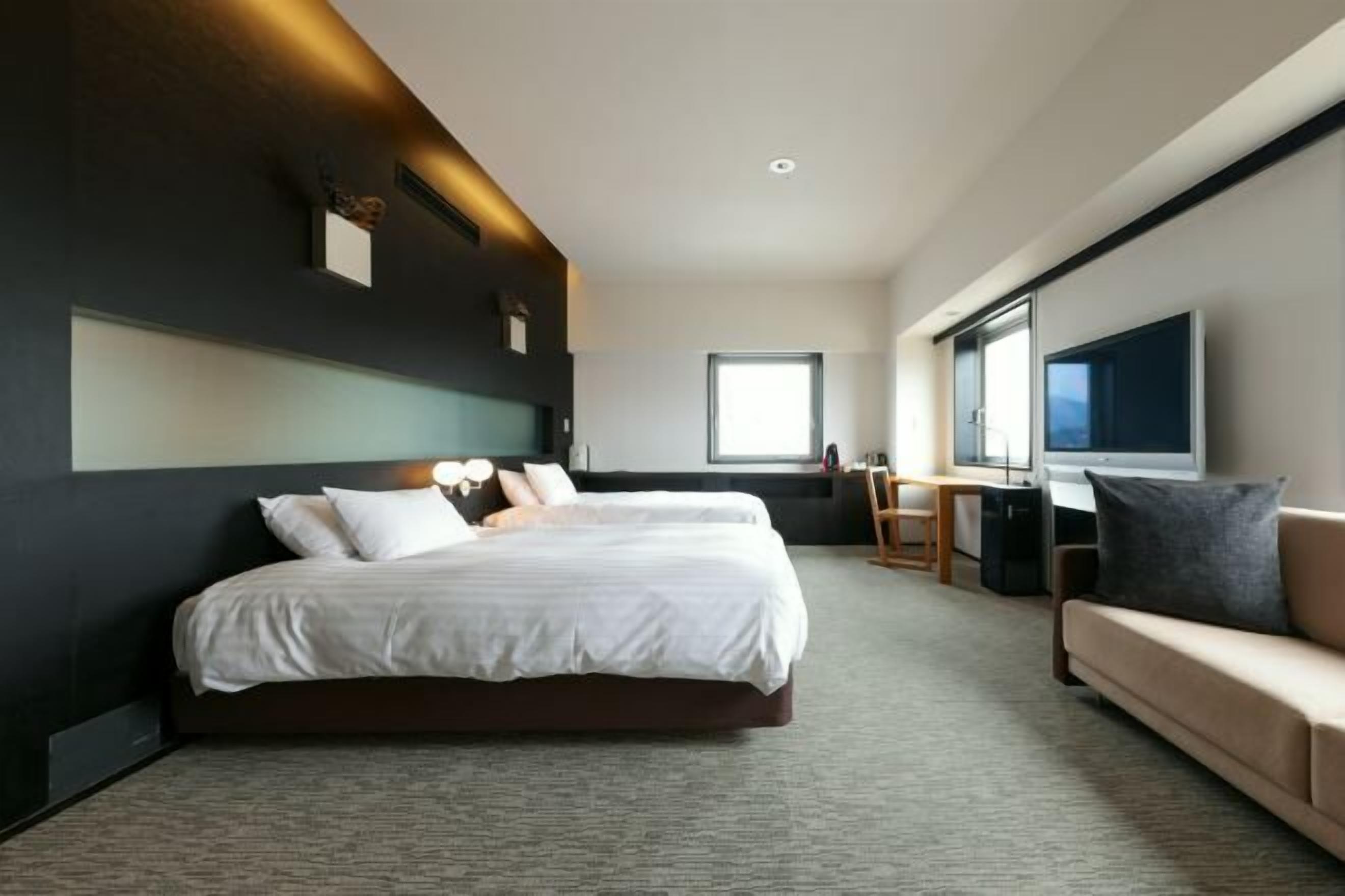 Premium bedding, down comforters, in-room safe, desk