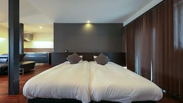 Premium bedding, down duvets, in-room safe, desk