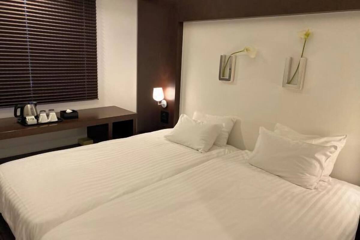 Premium bedding, down duvets, in-room safe, desk