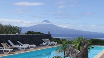 Indoor pool, outdoor pool, pool umbrellas, sun loungers