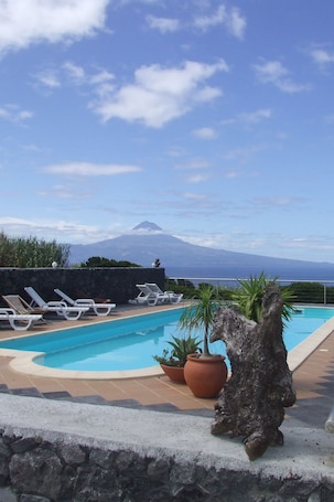 Indoor pool, outdoor pool, pool umbrellas, sun loungers