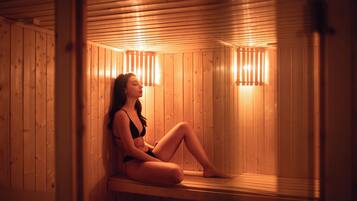 A sauna with wooden walls and benches.