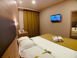 Ropa de cama hipoalergénica, edredón y minibar 