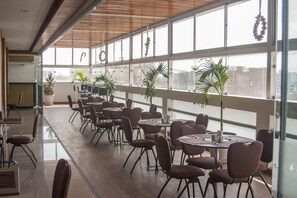 Breakfast, lunch, dinner served; pool views