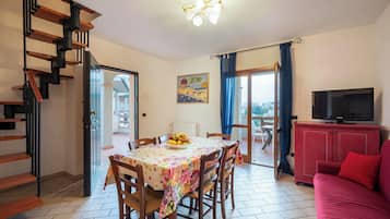 Superior Duplex, 3 Bedrooms, Patio, Pool View | Living area | 32-inch flat-screen TV with digital channels, LCD TV