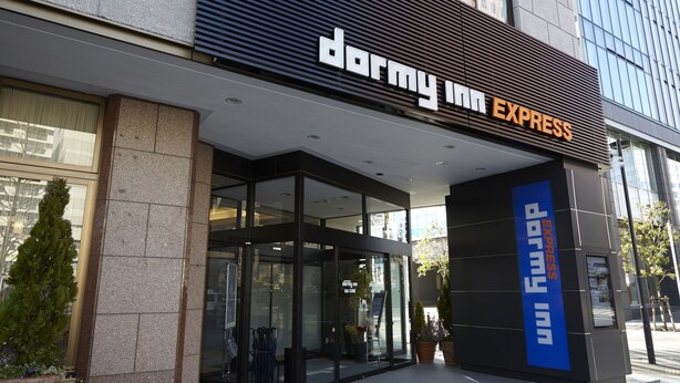 A modern building with a sign reading "dormy inn EXPRESS". - Dormy Inn Express Sendai Hirosedori Hot Spring (Sendai)