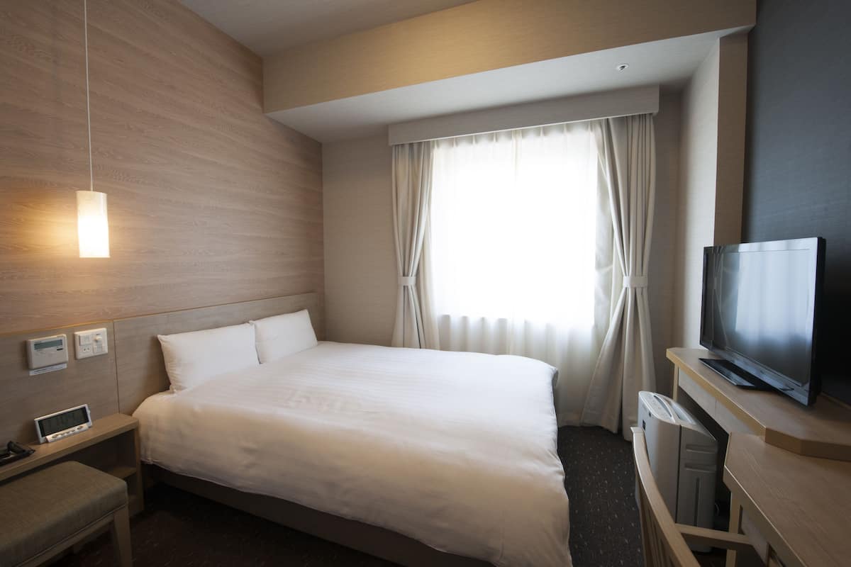 down duvets, desk, blackout curtains, iron/ironing board