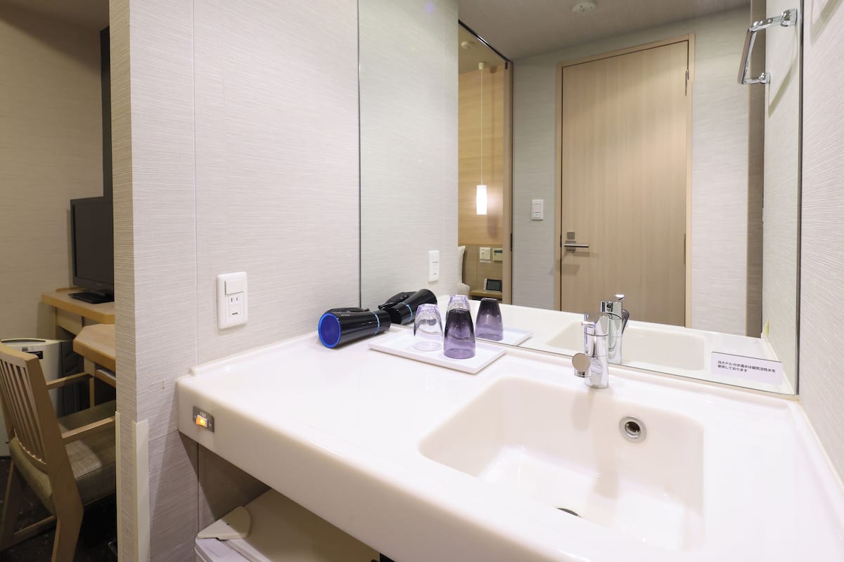 down duvets, desk, blackout curtains, iron/ironing board