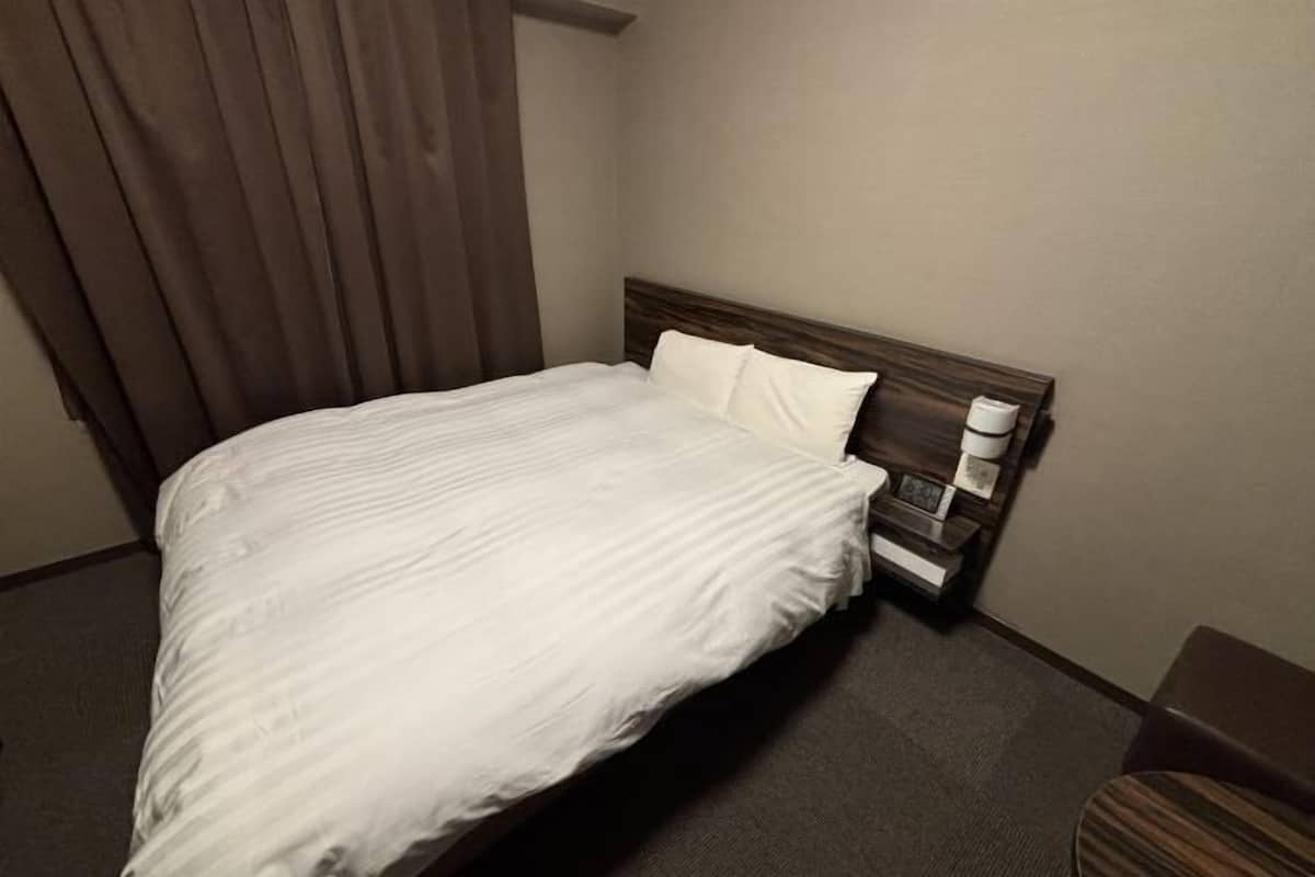 Down duvets, desk, blackout curtains, iron/ironing board