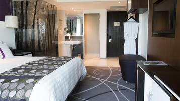 Premium bedding, down comforters, minibar, in-room safe