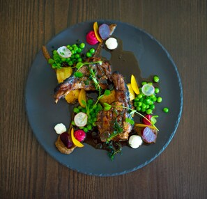 A plate of food with various vegetables and meat. - Hotel Verde Cape Town Airport (Cape Town)