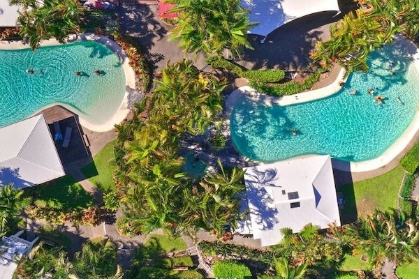 4 outdoor pools, open 7:30 AM to 9:00 PM, free cabanas, pool umbrellas