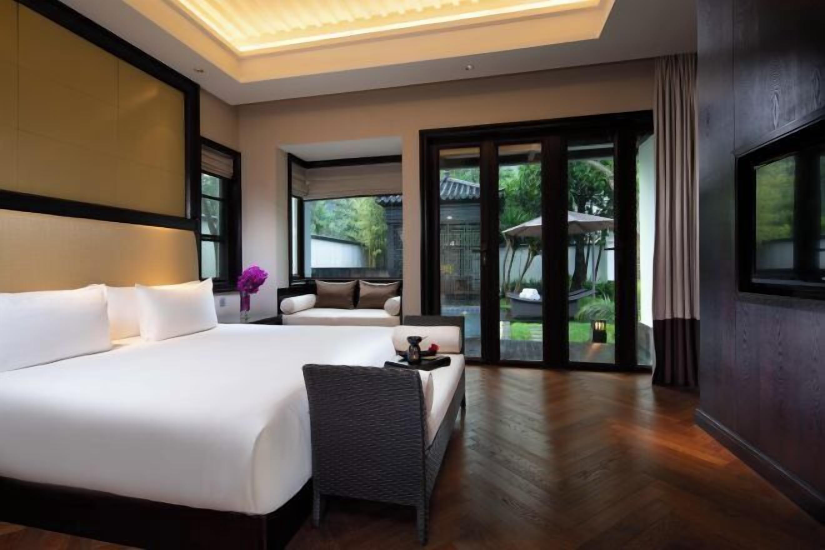 Hypo-allergenic bedding, down comforters, minibar, in-room safe