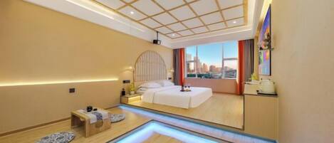 A modern bedroom with a large bed, a nightstand, and a view of a cityscape.